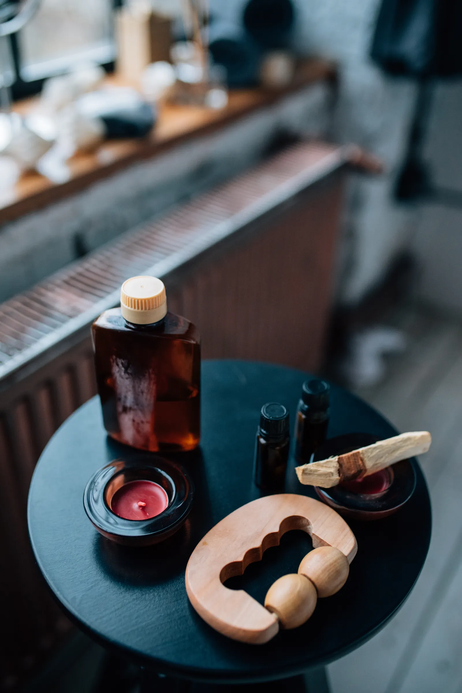 Tranquil aromatherapy scene with essential oils and a candle